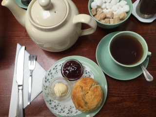 Fourteas tea, scone, clotted cream, jam (via K. Emmons)